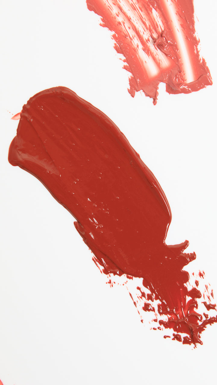 Deep red and rose blush serum texture swatches showing the rich, glossy consistency of Annadea blush formulas