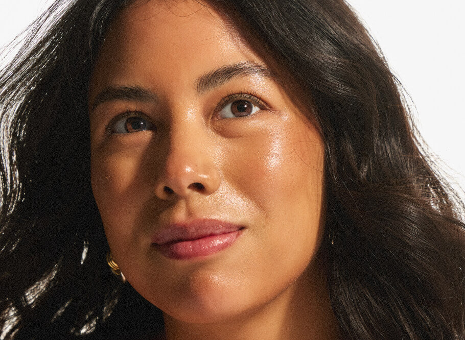 Close-up of a model with radiant, dewy skin and a natural luminous complexion, reflecting Annadea's skin-first approach to beauty