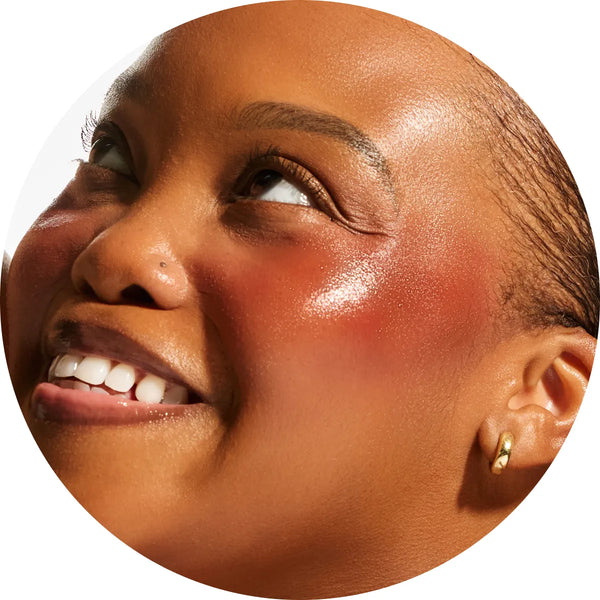 Close-up swatch of Annadea Power Walk Blush Serum in Late Date showing its rich deep burgundy-red gel texture, a buildable blush serum with warm bronze terracotta undertones that blends seamlessly for a sun-kissed bronzed flush