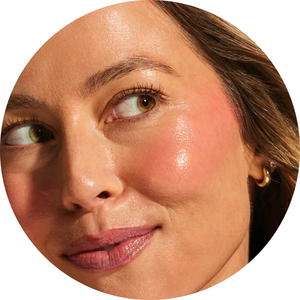 Close-up swatch of Annadea Power Walk Blush Serum in Rose Trail showing its muted dusty rose gel texture, a lightweight buildable blush serum with cool neutral undertones that blends seamlessly for a natural flushed finish