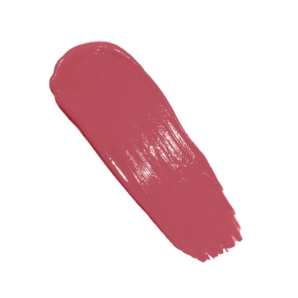 Close-up circular crop of a model with light skin tone showing a warm rosy flush across the cheek from the Annadea Power Walk Blush Serum in Rose Trail, reflecting the serum's naturally flushed plump and dewy finish
